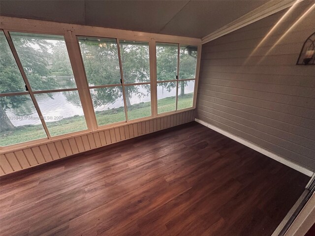 3125 Stonewater Dr Lakeland Fl, Lakeland Fl, FL 33803 - unfurnished sunroom featuring a water view, wood finished floors, lofted ceiling, and wood walls