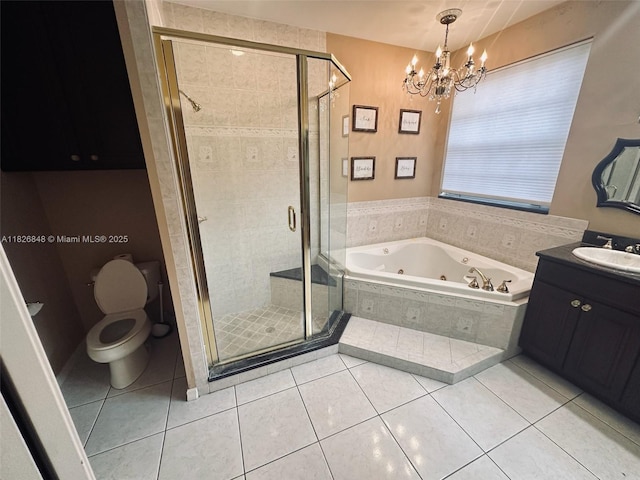 3125 Stonewater Dr Lakeland Fl, Lakeland Fl, FL 33803 - full bath with a tub with jets, vanity, a chandelier, a shower stall, and tile patterned floors