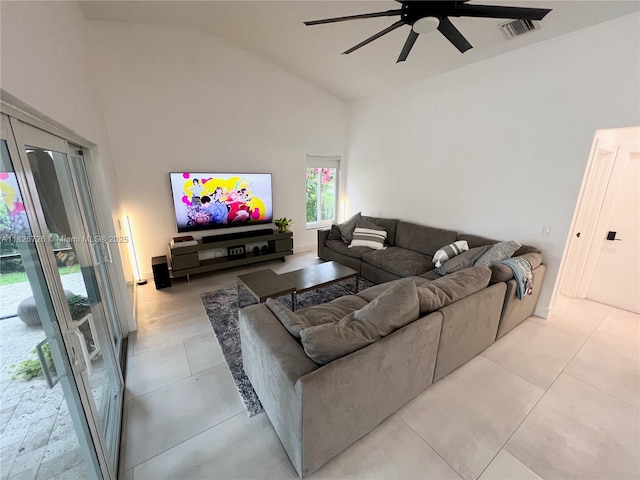 1732 SW 103rd Ln, Davie, FL 33324 - tiled living room with a ceiling fan and high vaulted ceiling