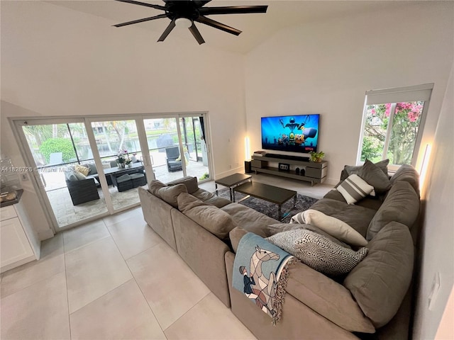 1732 SW 103rd Ln, Davie, FL 33324 - living room featuring high vaulted ceiling, ceiling fan, light tile patterned floors, and healthy amount of natural light