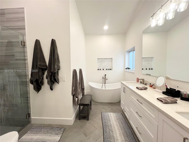 1732 SW 103rd Ln, Davie, FL 33324 - bathroom with a stall shower, double vanity, a freestanding tub, and tile patterned floors