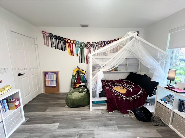 1732 SW 103rd Ln, Davie, FL 33324 - bedroom with heating unit and wood finished floors