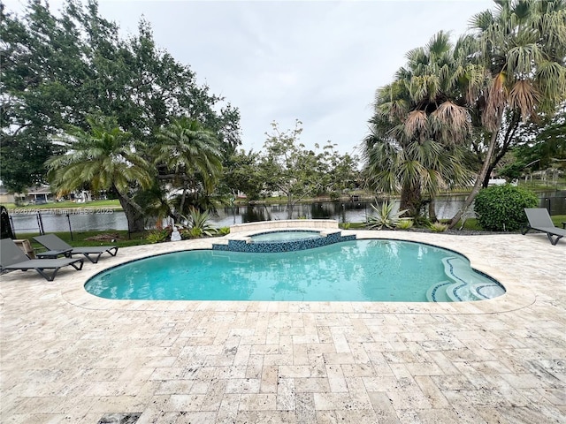 1732 SW 103rd Ln, Davie, FL 33324 - view of pool featuring a water view, a patio, and a pool with connected hot tub