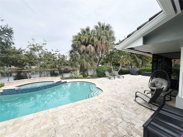 1732 SW 103rd Ln, Davie, FL 33324 - view of pool with a patio, a water view, and a pool with connected hot tub