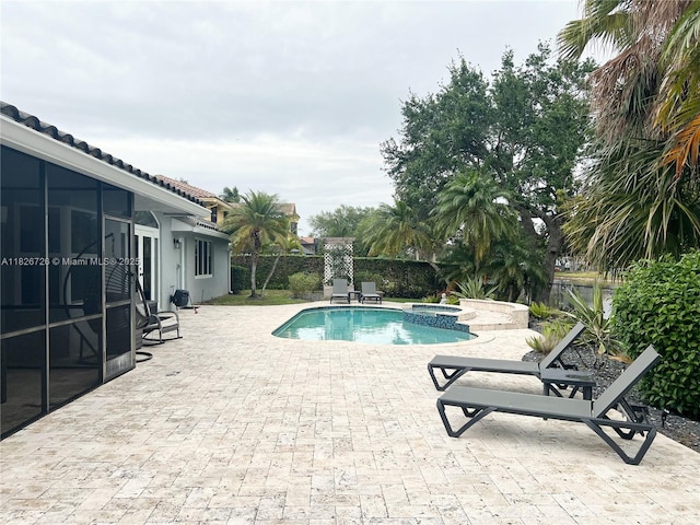 1732 SW 103rd Ln, Davie, FL 33324 - view of swimming pool featuring a patio, a fenced backyard, and an in-ground hot tub