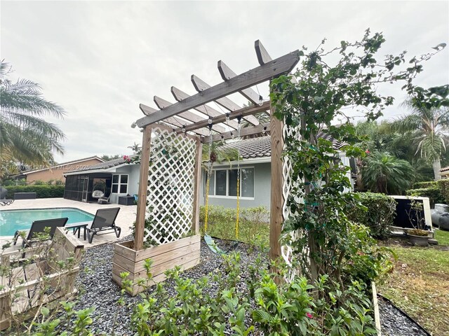 1732 SW 103rd Ln, Davie, FL 33324 - outdoor pool with a pergola, a sunroom, and a patio area