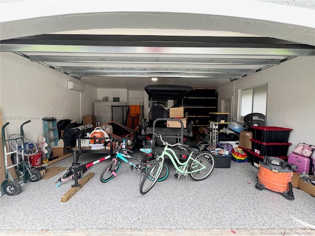 1732 SW 103rd Ln, Davie, FL 33324 - garage featuring a wall mounted AC