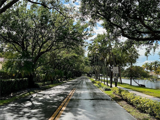 1732 SW 103rd Ln, Davie, FL 33324 - view of asphalt road with traffic signs and a water view