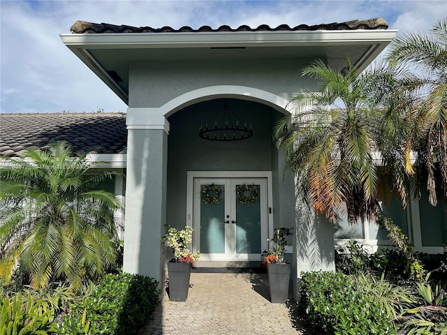 1732 SW 103rd Ln, Davie, FL 33324 - property entrance with stucco siding and french doors