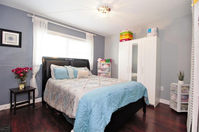 6503 Winfield Blvd Unit 111Ad, Margate, FL 33063 - bedroom with wood finished floors and baseboards