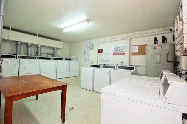 6503 Winfield Blvd Unit 111Ad, Margate, FL 33063 - shared laundry room with washer and dryer and water heater
