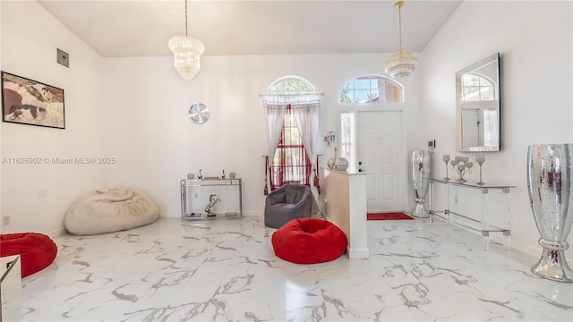1720 SW 137th Way, Miramar, FL 33027 - foyer entrance featuring a chandelier and marble finish floors