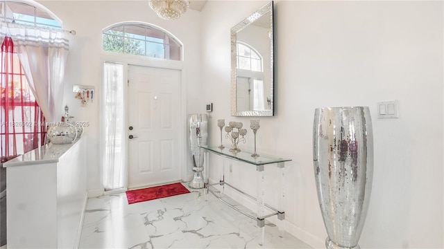 1720 SW 137th Way, Miramar, FL 33027 - foyer entrance with marble look tile flooring and baseboards