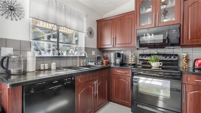 1720 SW 137th Way, Miramar, FL 33027 - kitchen with black appliances, tasteful backsplash, dark countertops, and glass insert cabinets