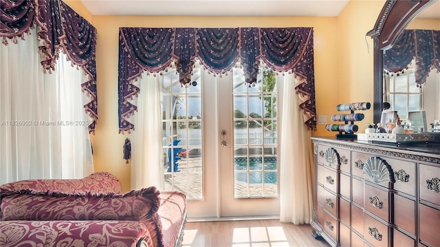 1720 SW 137th Way, Miramar, FL 33027 - doorway to outside featuring light wood-type flooring