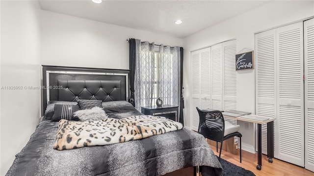 1720 SW 137th Way, Miramar, FL 33027 - bedroom featuring multiple closets, wood finished floors, and recessed lighting