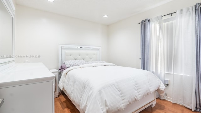 1720 SW 137th Way, Miramar, FL 33027 - bedroom with light wood finished floors and recessed lighting