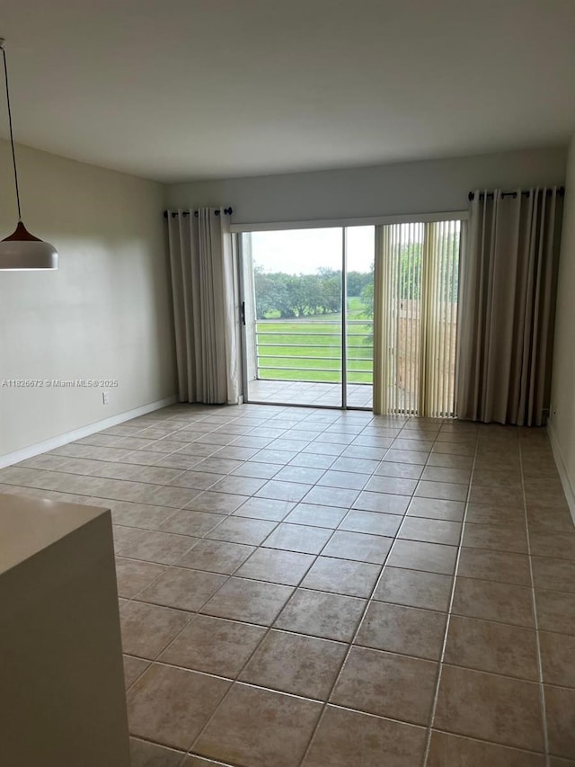 5100 SW 90th Ave Unit 406, Cooper City, FL 33328 - spare room featuring tile patterned flooring and plenty of natural light