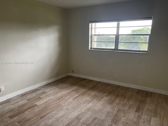 5100 SW 90th Ave Unit 406, Cooper City, FL 33328 - spare room featuring wood finished floors