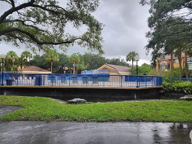 15405 N Miami Lakeway N Unit 307, Miami Lakes, FL 33014 - view of pool featuring a wooden deck