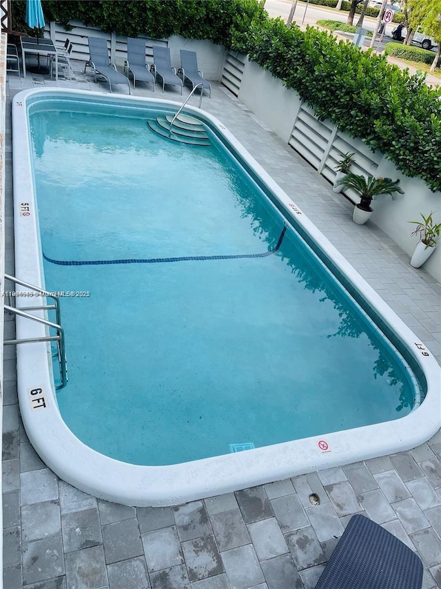 1698 Jefferson Ave Unit 9, Miami Beach, FL 33139 - community pool featuring a patio