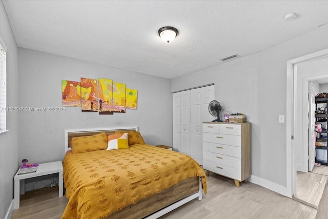 7307 SW 8th St, North Lauderdale, FL 33068 - bedroom with light wood-type flooring and a closet