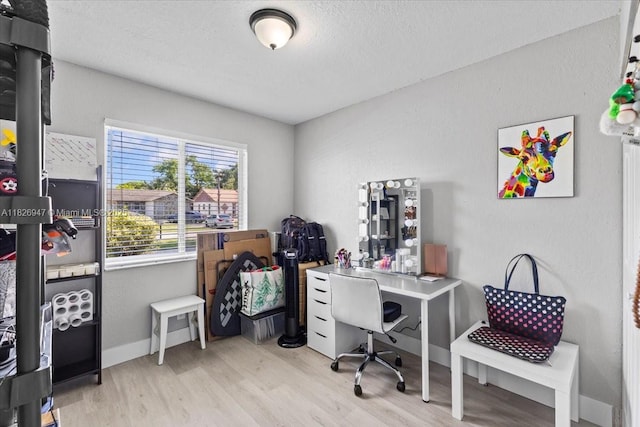 7307 SW 8th St, North Lauderdale, FL 33068 - home office with wood finished floors and a textured ceiling