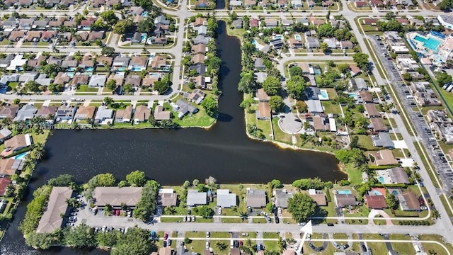 7307 SW 8th St, North Lauderdale, FL 33068 - aerial overview of property's location featuring a large body of water and nearby suburban area