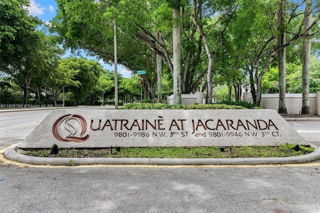 9852 NW 3rd Ct Unit 1, Plantation, FL 33324 - community / neighborhood sign with view of scattered trees