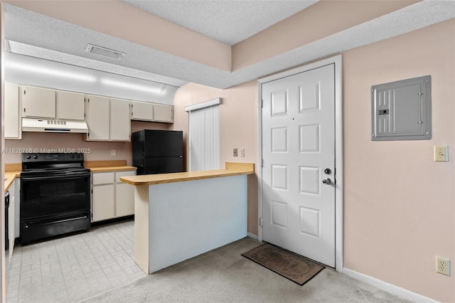 9852 NW 3rd Ct Unit 1, Plantation, FL 33324 - kitchen featuring black appliances, under cabinet range hood, electric panel, and a peninsula