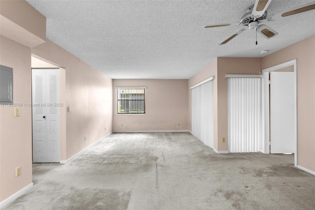 9852 NW 3rd Ct Unit 1, Plantation, FL 33324 - carpeted empty room featuring ceiling fan, a textured ceiling, and a smoke detector