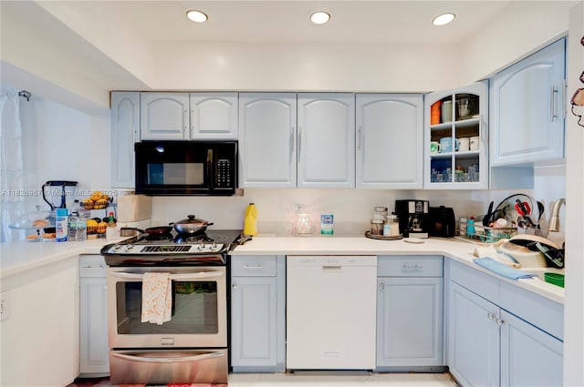 13645 NW 3rd Ave, North Miami, FL 33168 - kitchen with dishwasher, black microwave, stainless steel electric stove, glass insert cabinets, and light countertops