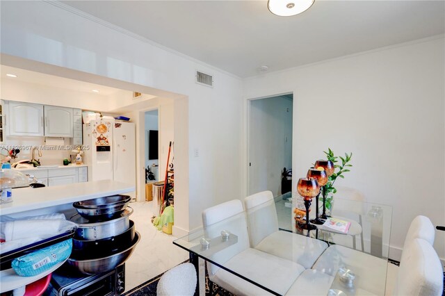 13645 NW 3rd Ave, North Miami, FL 33168 - dining room featuring ornamental molding