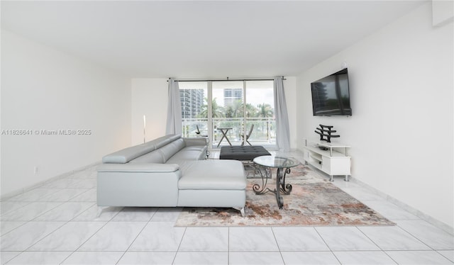 2030 S Ocean Dr Unit 227, Hallandale Beach, FL 33009 - living room featuring expansive windows and marble finish flooring