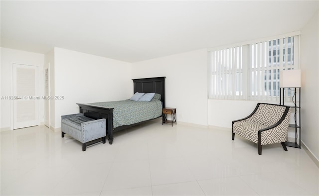 2030 S Ocean Dr Unit 227, Hallandale Beach, FL 33009 - tiled bedroom with baseboards