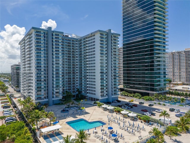2030 S Ocean Dr Unit 227, Hallandale Beach, FL 33009 - view of building exterior with a community pool