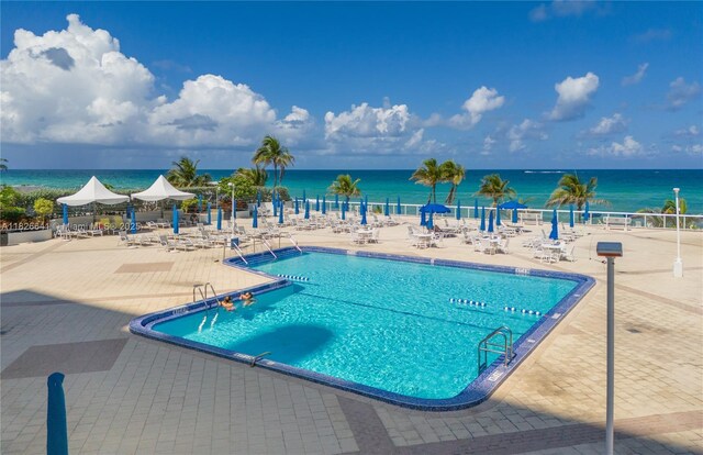 2030 S Ocean Dr Unit 227, Hallandale Beach, FL 33009 - community pool featuring a patio area and a water view