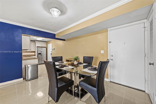 1428 SE 4th Ave Unit 146, Deerfield Beach, FL 33441 - dining room featuring crown molding and light tile patterned floors