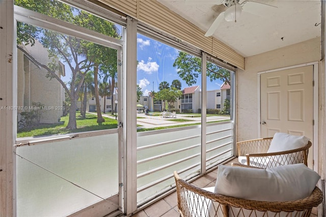 1428 SE 4th Ave Unit 146, Deerfield Beach, FL 33441 - sunroom with ceiling fan and a residential view