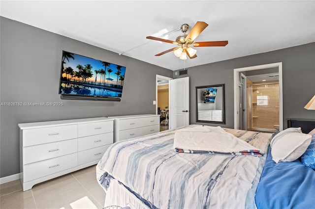 1428 SE 4th Ave Unit 146, Deerfield Beach, FL 33441 - bedroom with light tile patterned floors, ceiling fan, and connected bathroom