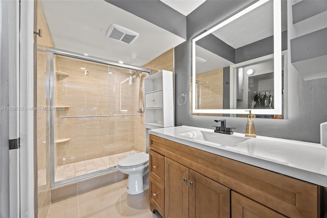 1428 SE 4th Ave Unit 146, Deerfield Beach, FL 33441 - bathroom featuring a shower stall, vanity, and tile patterned floors