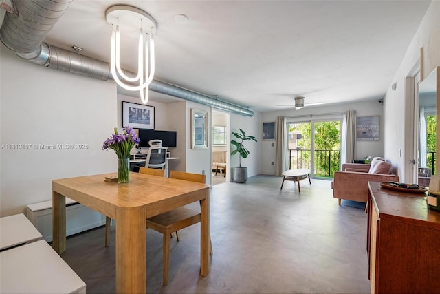 1900 Meridian Ave Unit 204, Miami Beach, FL 33139 - dining area featuring a ceiling fan and finished concrete flooring