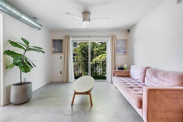 1900 Meridian Ave Unit 204, Miami Beach, FL 33139 - living area with concrete flooring and ceiling fan