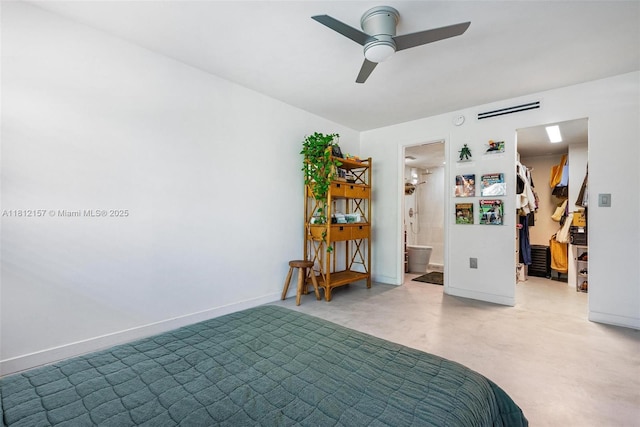 1900 Meridian Ave Unit 204, Miami Beach, FL 33139 - bedroom featuring a spacious closet, ensuite bath, a closet, and a ceiling fan