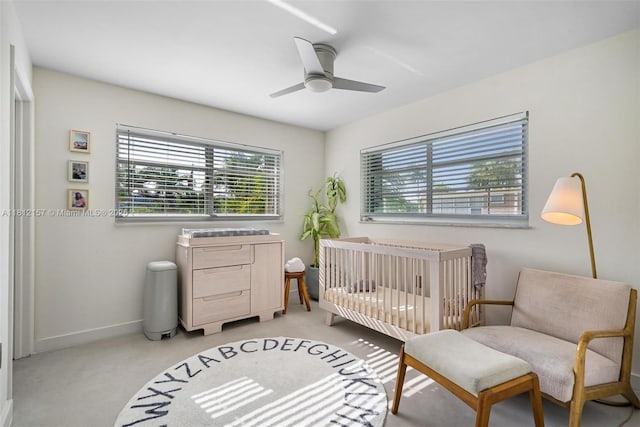1900 Meridian Ave Unit 204, Miami Beach, FL 33139 - bedroom with a ceiling fan, a nursery area, and light colored carpet