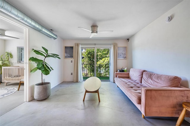 1900 Meridian Ave Unit 204, Miami Beach, FL 33139 - living area featuring concrete flooring and a ceiling fan