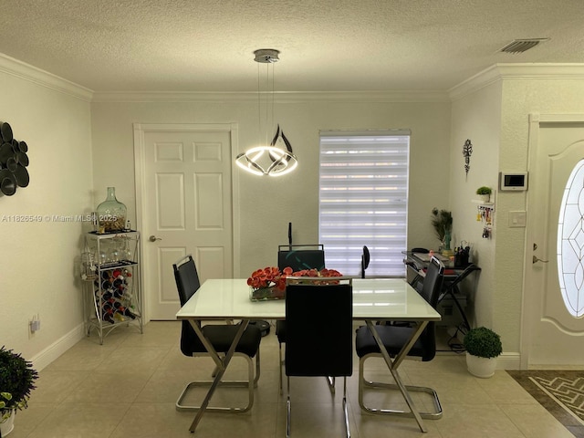 7322 SW 134th Pl, Miami, FL 33183 - dining space with healthy amount of natural light, a textured ceiling, ornamental molding, and light tile patterned floors