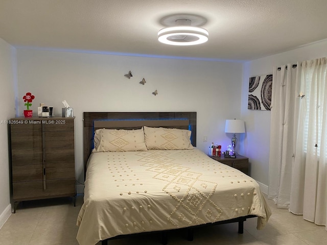7322 SW 134th Pl, Miami, FL 33183 - tiled bedroom featuring baseboards