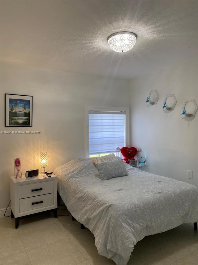7322 SW 134th Pl, Miami, FL 33183 - bedroom featuring a textured ceiling and light tile patterned flooring