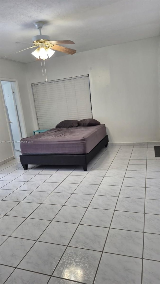 7322 SW 134th Pl, Miami, FL 33183 - bedroom featuring light tile patterned floors and ceiling fan